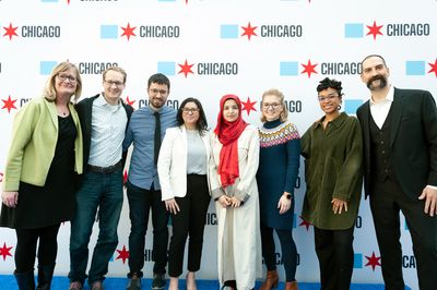 Pictured: Members of DePaul University's EXP480 Collaboration Studio, Dr. Denise Nacu, and Jason Kunesh (far right), celebrating the launch of teh Chicago Design System.